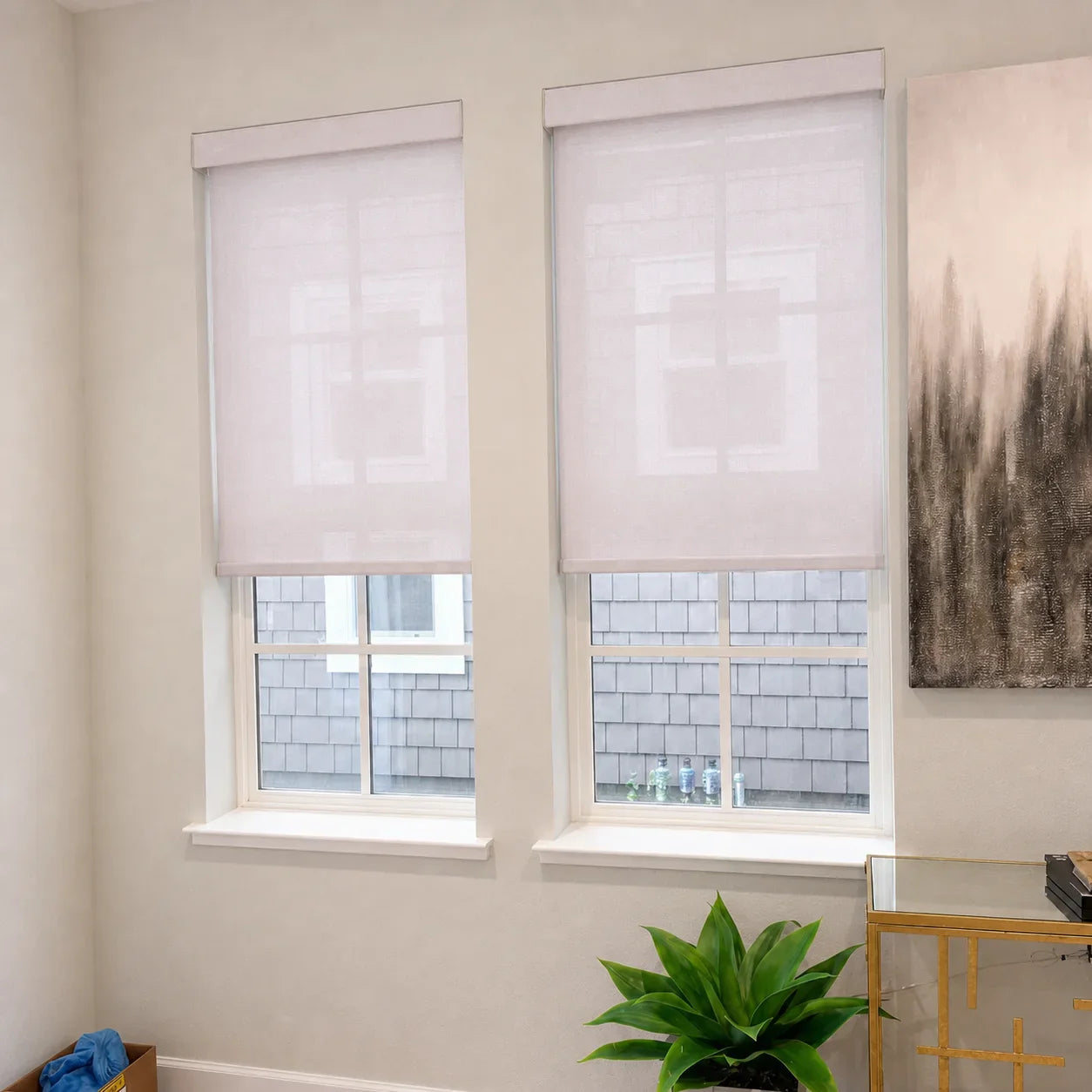 Close-up of a custom roller shade and layered fabric